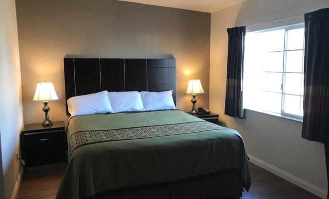Manhattan Inn & Suites